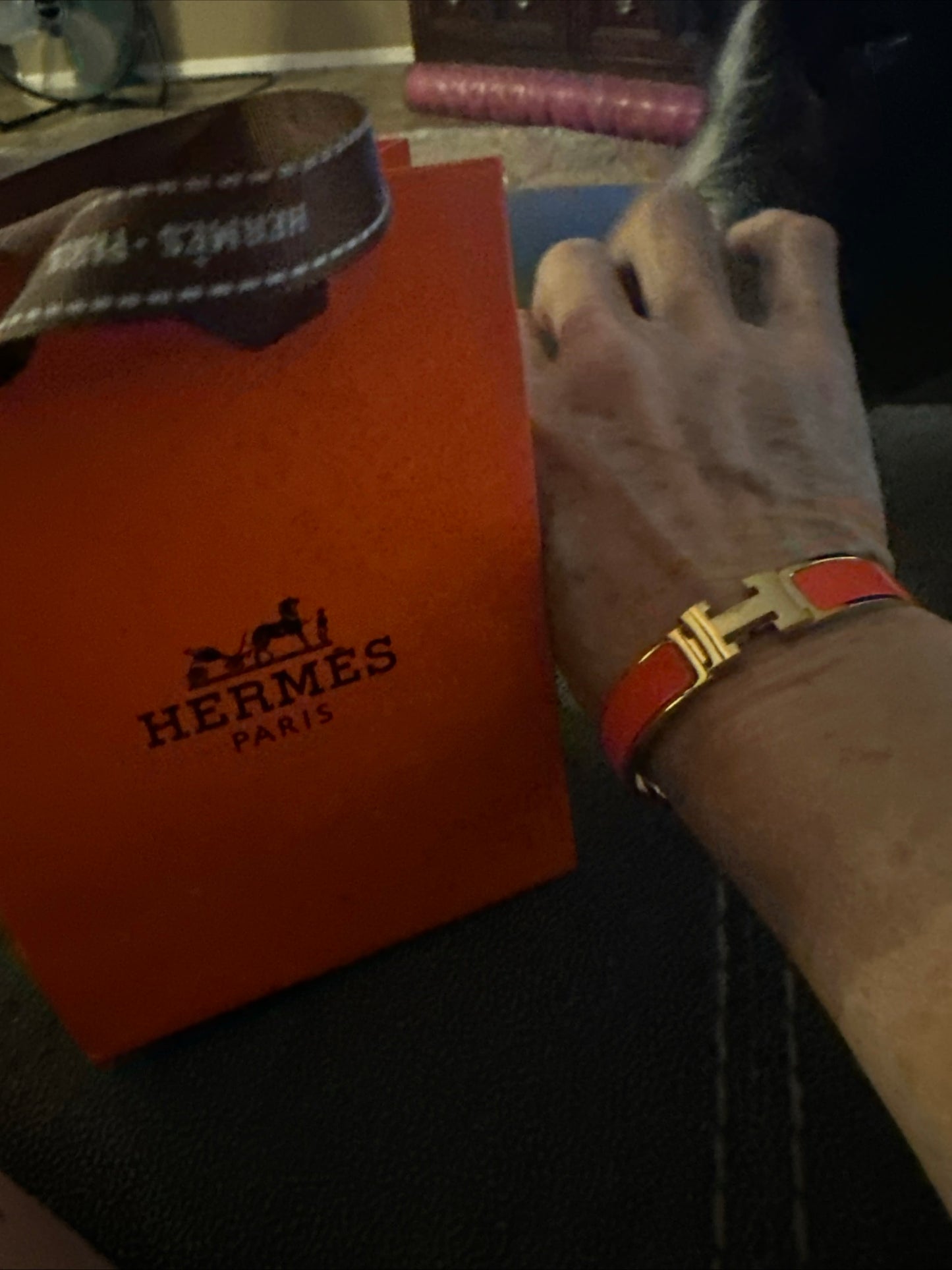 H Clic bracelet, yellow gold plated with bright orange coated enamel